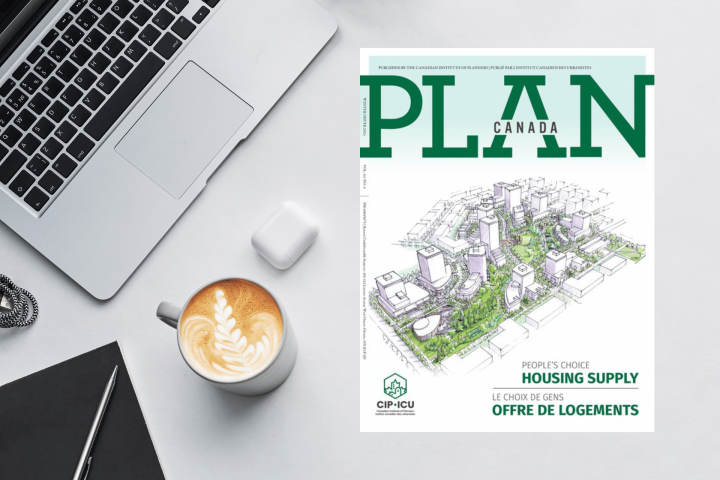 A top-down view of a workspace includes a silver laptop with a black keyboard, a white coffee cup with latte art, a black notebook with a pen, and a pair of wireless earbuds in their white case. Next to this setup is a magazine titled "PLAN CANADA" with a cover featuring an illustrated cityscape design, showcasing buildings, green spaces, and pathways. The bottom-right text on the magazine highlights a focus on "HOUSING SUPPLY" and "OFFRE DE LOGEMENTS," published by CIP-ICU, the Canadian Institute of Planners.
